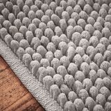 Bianca Siva kupaonska prostirka 50x120 cm Aspen Bobble – | shoptok.hr