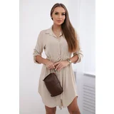 Kesi Dress with a button and a tie at the waist in beige color