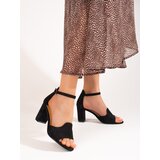 W. POTOCKI Black women's sandals on a post Cene
