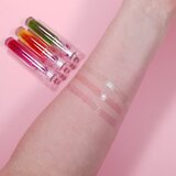 Revolution Tasty Tropical tonirajuće ulje za usne za sjaj i hidrataciju nijansa Papaya 3,8 ml | shoptok.hr