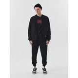- Joggers - Crna