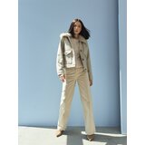 Sinsay Rebrasta bluza s dodatkom viskoze i ukrasnim gumbima Slike