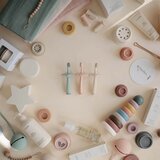 Mushie silikonska zobna ščetka star shifting | Shoptok.si
