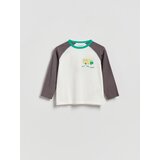 Reserved Pamučna majica dugih rukava s printom - krem | shoptok.hr