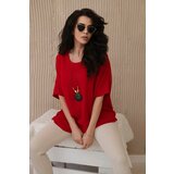 Kesi Oversized blouse with red pendant Cene
