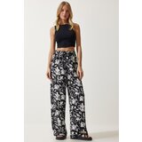  women's white black patterned flowy viscose palazzo trousers Cene