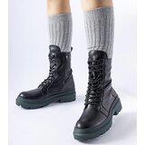 D/CEO Gemre Black boots on a light green sole Quennie Cene