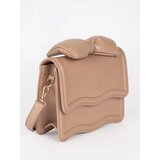 Shelvt Small beige women's handbag with a bow | Shoptok.si