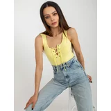 Fashion Hunters Light yellow women's top with lace-up neckline