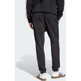 Adidas Športne hlače 'FEELCOZY' črna / bela | Shoptok.si