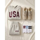 Sinsay Dres hlače jogger s izvezenim natpisom USA Slike