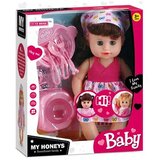 Magic Toys Lutka za hranjenje v roza obleki s kahlico in dodatki, z zvokom | Shoptok.si