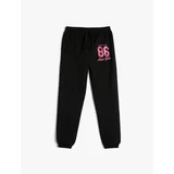 Koton Jogger Sweatpants with Tie Waist and Glitter Print Detail