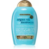 OGX Argan Oil Of Morocco Extra Strenght obnovitveni balzam za poškodovane lase 385 ml