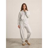 Sinsay Jogger trenirka od terry pletiva s prošivima i vezom | shoptok.hr