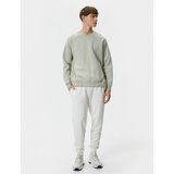 Koton Jogger Sweatpants with Lace Waist and Pocket Detail cene