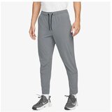 Nike M nk df unlimited pant tpr Cene