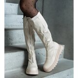 Gemre Beige eco leather flat heel boots decorated with a zipper Hala | Shoptok.si