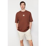 Trendyol Men's Brown Oversize/Wide-Fit Crew Neck Text Printed 100% Cotton T-Shirt Cene