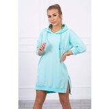 Kesi Dress with a hood and a longer back mint Cene