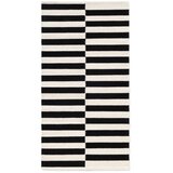 Hanse Home Črna/bela obojestranska ročno tkana volnena preproga 80x150 cm Donna – Cene