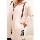 Kesi Włoski Plus Size women's quilted jacket with a hood and the inscription HOPE light beige | shoptok.hr