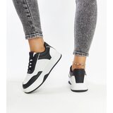Gemre White and black sneakers on a thicker sole Rumai | Shoptok.si
