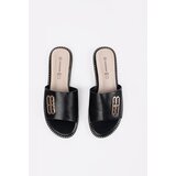 GOODIN Black women's flip-flops on a flat sole | Shoptok.si