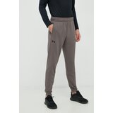 Under Armour Donji dio trenirke Armour Fleece za muškarce, boja: siva, glatki materijal | shoptok.hr