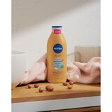 Nivea Winter Moment hranilno mleko za telo z karitejevim maslom 400 ml | Shoptok.si