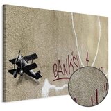  Slika - Banksy\'s Plane (1-part) - Red Graffiti Text on Mural Background 120x80 Premium Print | shoptok.hr