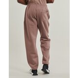 New Balance Spodnji deli trenirke LINEAR GRAPHIC FLEECE PANT Kostanjeva | Shoptok.si