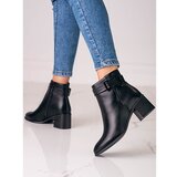 SHELOVET Classic black women&#039;s ankle boots on a low post cene