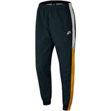 Nike donji deo muške trenerke M NSW HE WR PANT WVN SIGNATURE CJ5484-364 | ePonuda.com