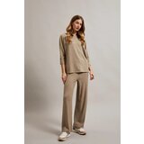 Moodo Women's ribbed trousers with metallic thread - beige Cene