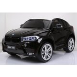 BMW X6 m licencirani dvosed na akumulator sa kožnim sedištima i mekim gumama - crni Cene