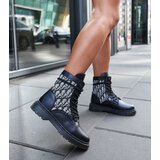 Gemre Black boots adorned with Giraldo monogram | Shoptok.si
