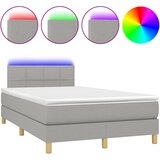 vidaXL Box spring postelja z vzmetnico LED sv. siva 120x190 cm blago | Shoptok.si