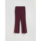 Reserved Flare hlače izglačane na crtu - burgundy | shoptok.hr
