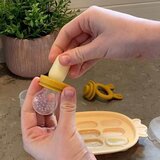 Haakaa silikonski model za pripremu međuobroka ananas Orange peach | shoptok.hr