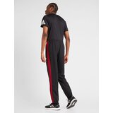 Adidas Športna trenirka rdeča / črna / bela | Shoptok.si