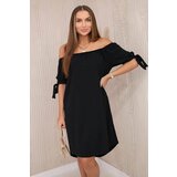 Kesi Dress with a longer back and ties on the sleeves black cene