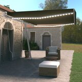 vidaXL Ročno zložljiva tenda z LED lučkami 500x350 cm antracitna Cene