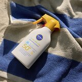 Nivea Sun Babies & Kids Sensitive Protect Spray SPF50+ zaščitna krema za sončenje za občutljivo kožo 270 ml | Shoptok.si