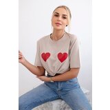 Kesi Cotton blouse with beige heart print Cijene