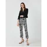 Koton zebra patterned trousers slim fit Cene