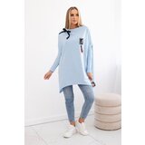 Kesi Oversized sweatshirt with asymmetrical sides in cyan color | Shoptok.si