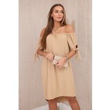 Kesi Dress with a longer back and ties on the sleeves Camel cene