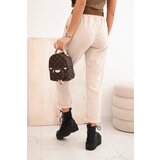 Kesi Włoski Women's pants with a striped belt beige | shoptok.hr