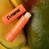 Dr.PAWPAW Flavoured Balm vlažilni balzam za ustnice okus Mango 4 g | Shoptok.si